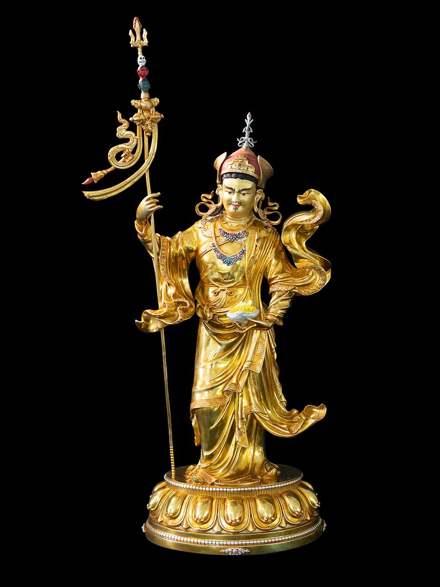 Tibetan Buddhist Lotus Born Lama handcrafted in brass, engraved with Buddha statue art and traditional Tibetan Buddhist craftsmanship.