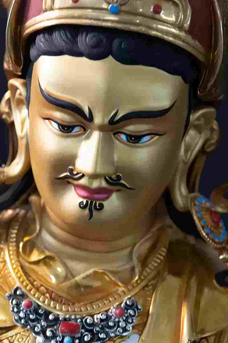 Tibetan Buddhist Buddha statue art, hand-engraved Lotus Born Lama statue made of brass, showcasing traditional Tibetan craftsmanship.