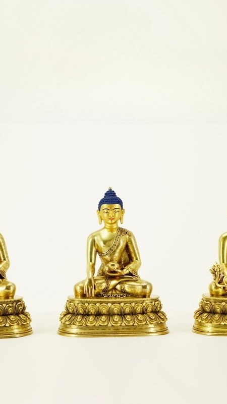 Alt Text: Tibetan Buddhist Triple Buddha statue, handcrafted with gilded gold and mineral pigments, a rare collectible piece of traditional Buddhist art.