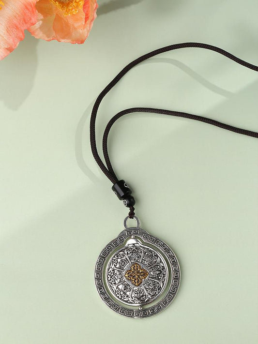 Tibetan Buddhist copper Nine Palaces Bagua pendant, handmade spiritual jewelry symbolizing balance and protection.