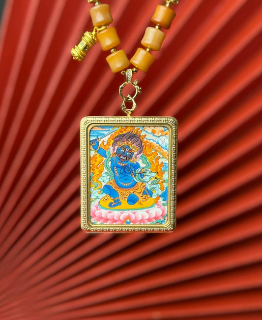 Detailed view of the titanium casing for the Acala Thangka pendant, symbolising protection and tradition in Buddhist practice.