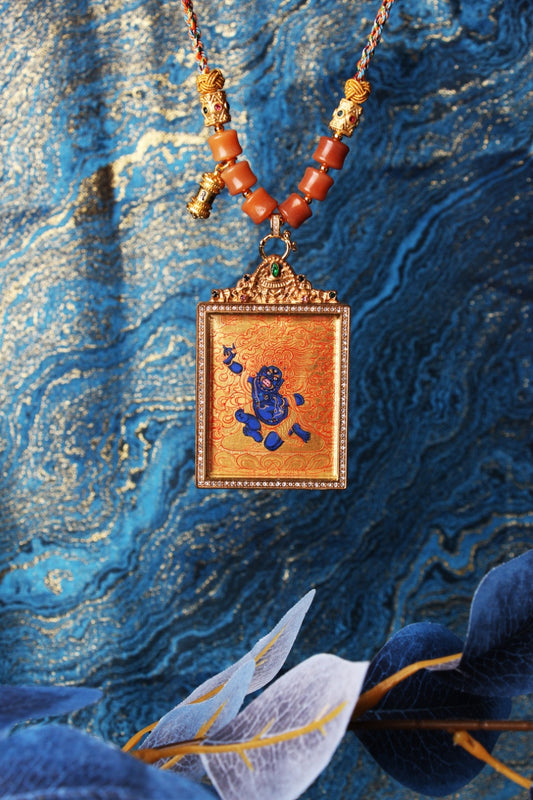 The Rebgong Acala Thangka pendant displayed as a sacred amulet for discipline and obstacle removal, embodying the fierce wisdom of Tibetan Buddhist tradition.