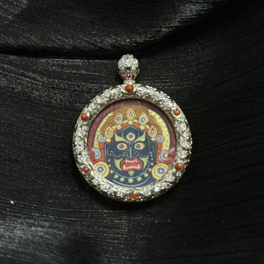 Close-up detail of the Rekong Red-Gold Acala Buddha Head Thangka painting showing mineral pigments and gold leaf, showcasing the masterful artistry of Rekong lineage painters.