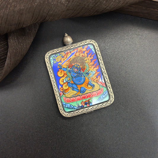 A 3.5x4.5cm hand-painted Rekong Acala (不动明王) Thangka pendant with 925 silver featuring the chief of the Five Wisdom Kings, representing protection and discipline in Buddhist tradition.