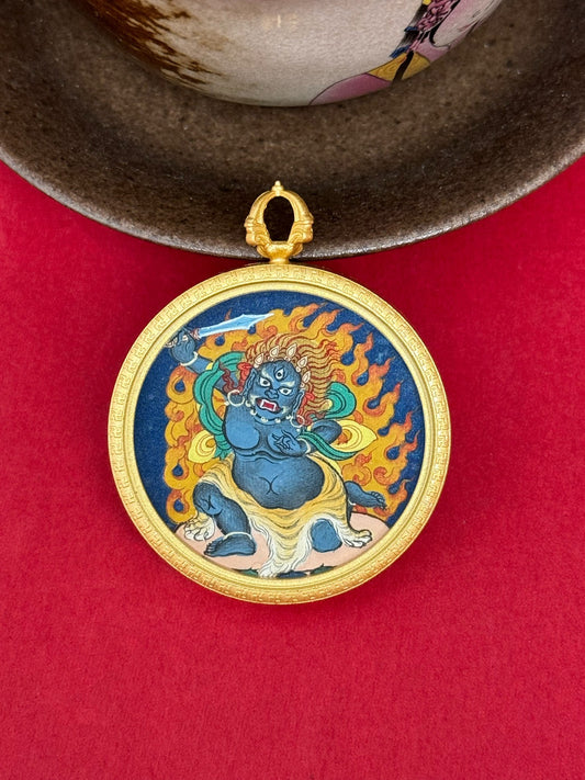 Close-up detail of the Tibet Bold Acala Thangka showing hand-painted mineral pigments, gold and lapis, showcasing the masterful artistry and three-dimensional imagery.