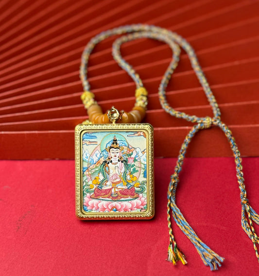 Close-up detail of the Nepal Akasagarbha Thangka showing hand-painted mineral pigments, showcasing the masterful artistry.