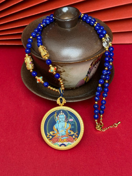Hand-painted Tibet Bold Akasagarbha (虚空藏菩萨) Thangka pendant 3.5cm with copper casing featuring the wealth deity of the Buddhist realm, representing wisdom and wealth in Buddhist tradition.
