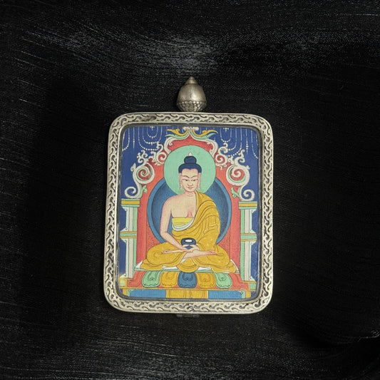 Close-up detail of the Chigung Amitabha Thangka painting showing intricate natural mineral pigment work and serene iconography, showcasing the artistry of Tibetan lineage painters.