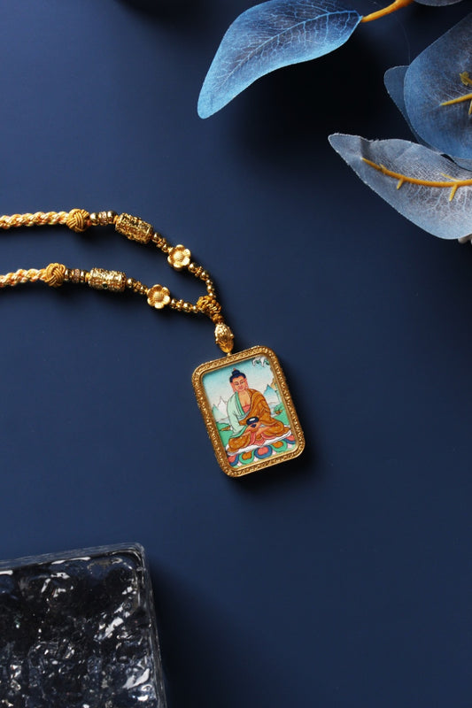 A 4x5cm hand-painted Karma Kagyu Amitabha Buddha Thangka pendant featuring the Buddha of Infinite Light, encased in titanium steel, representing Pure Land rebirth in Tibetan Buddhist tradition.