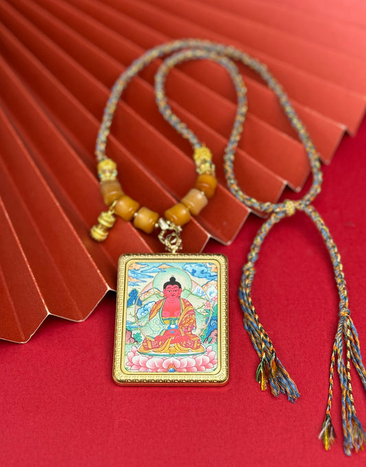 Hand-painted Nepal Amitabha (阿弥陀佛) Thangka pendant 4x5cm with titanium casing featuring the lord of the Western Pure Land, representing peace in Buddhist tradition.