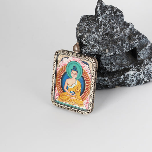 A 3.5x4.5cm hand-painted Rebgong Amitabha Buddha Thangka pendant featuring the Buddha of Infinite Light and Life, encased in titanium steel, representing liberation and peace in Tibetan Buddhist tradition.