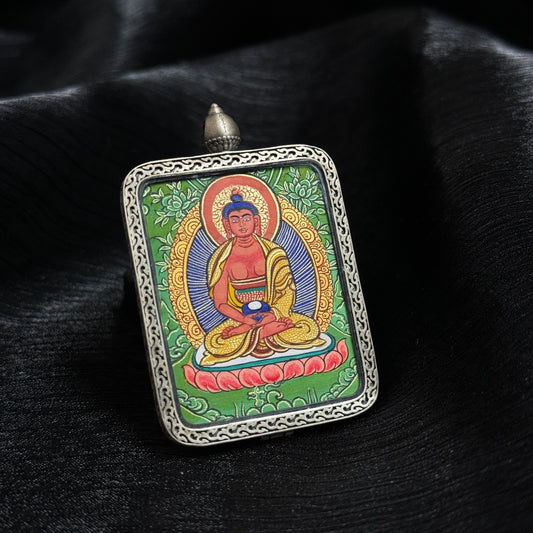 A 3.5x4.5cm hand-painted Rekong Cuiying series Amitabha Buddha Thangka pendant featuring the lord of the Western Pure Land, representing elimination of karma and peace in Buddhist tradition.