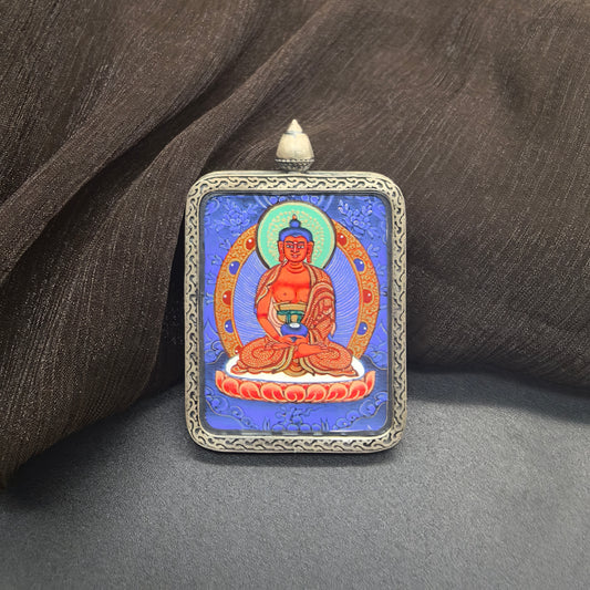 Close-up detail of the Rekong Blue Thangka Amitabha painting showing natural mineral pigments, showcasing the masterful artistry of Rekong lama painters.