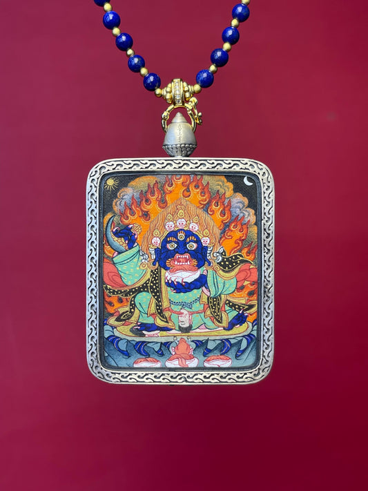 Detailed view of the copper casing for the Black-Cloak Mahakala Thangka pendant, symbolising protection and tradition in Buddhist practice.