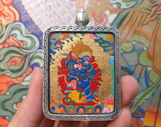 Close-up detail of the Tibet Black Jambhala Thangka showing hand-painted lapis lazuli, cinnabar and gold, showcasing the Tibet Premium series artistry.