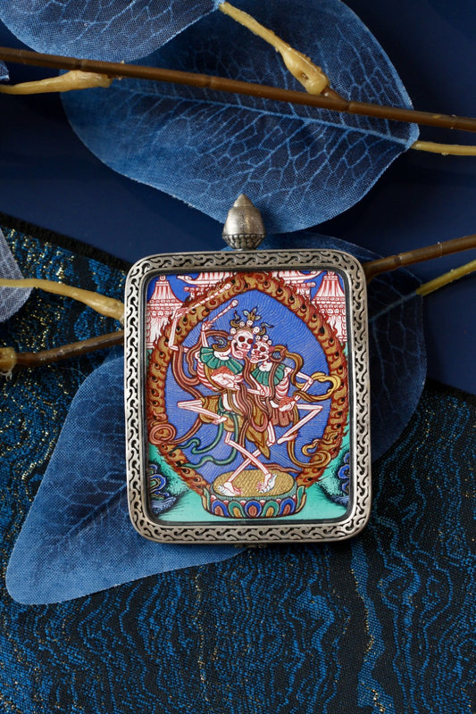 Chitipati thangka pendant depicting the Tibetan Buddhist cemetery guardian kings, symbolizing impermanence and wisdom in Vajrayana Buddhism