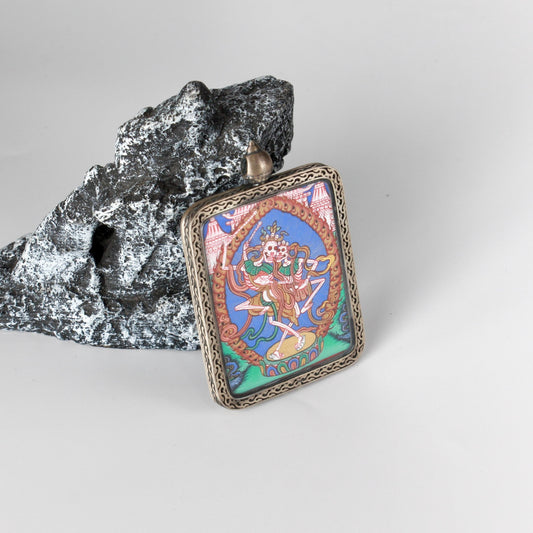 Close-up detail of the Rebgong Chitipati Thangka painting showing intricate natural mineral pigment work, showcasing the masterful artistry of Rebgong lineage painters.