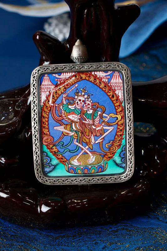 Tibetan Chitipati thangka necklace pendant, symbolizing protection, mindfulness of death, and enlightenment in Tibetan Buddhism
