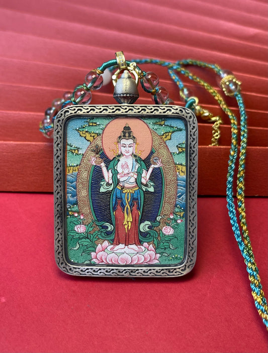 Close-up detail of the Tibet Eyes-Opening Avalokiteshvara Thangka showing mineral pigments and gold, showcasing Tibet series artistry.