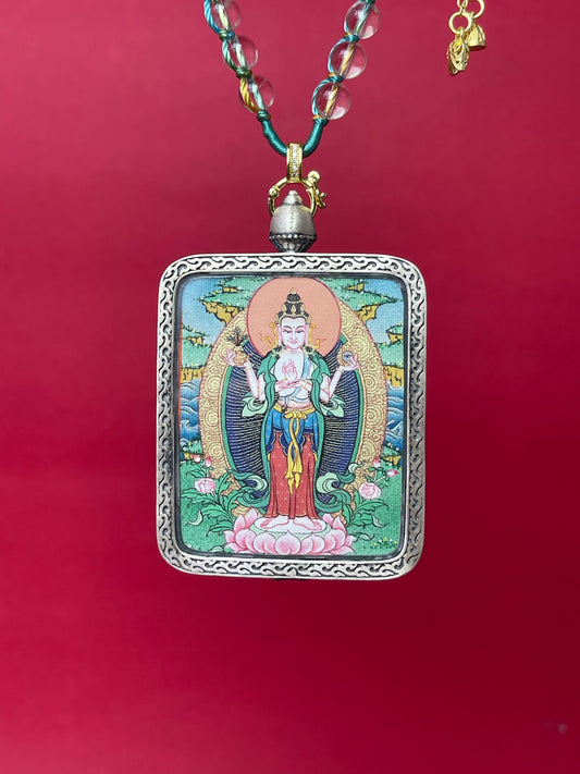 Detailed view of the copper casing for the Eyes-Opening Avalokiteshvara Thangka pendant, symbolising open eyes to Dharma and tradition in Buddhist practice.