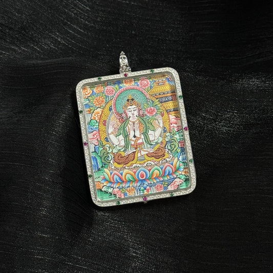 A 4x5cm hand-painted Four-Armed Avalokiteshvara with Eight Guardians and Mandala Thangka pendant featuring the embodiment of great compassion, representing family protection and peace in Tibetan Buddhist tradition.