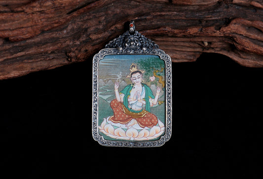 Close-up detail of the Karma Gadri Four-Armed Avalokiteshvara Thangka showing hand-painted mineral pigments, showcasing the Karma Gadri series artistry.