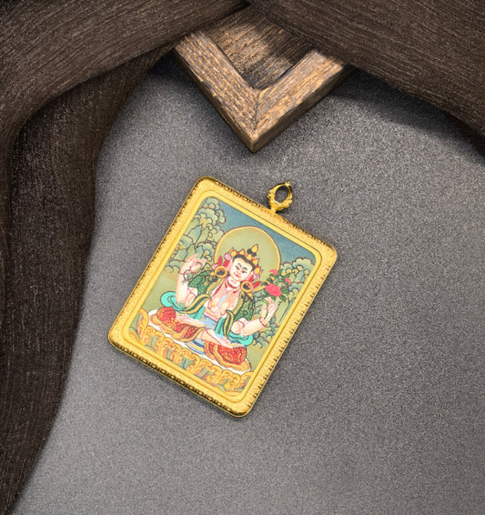 Close-up detail of the Nepal Four-Armed Avalokiteshvara Thangka showing hand-painted mineral pigments, showcasing the masterful artistry.