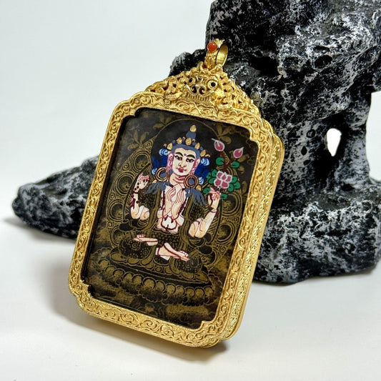 Hand-painted Nepal Black Gold Four-Armed Avalokiteshvara Thangka pendant featuring the Embodiment of Great Compassion, copper casing, representing compassion and peace in Tibetan Buddhist tradition.