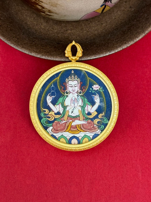 Close-up detail of the Tibet Bold Four-Armed Avalokiteshvara Thangka showing hand-painted mineral pigments, gold and lapis, showcasing the masterful artistry and three-dimensional imagery.