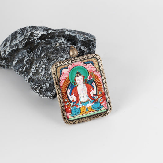 Hand-painted Tibet Red Cloud Four-Armed Avalokiteshvara Thangka pendant featuring the Bodhisattva of Great Compassion, encased in titanium steel, representing compassion in Tibetan Buddhist tradition.