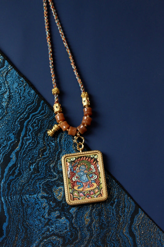 Acalanatha Pendant, representing the symbol of unwavering protection and courage in Tibetan Buddhist tradition.