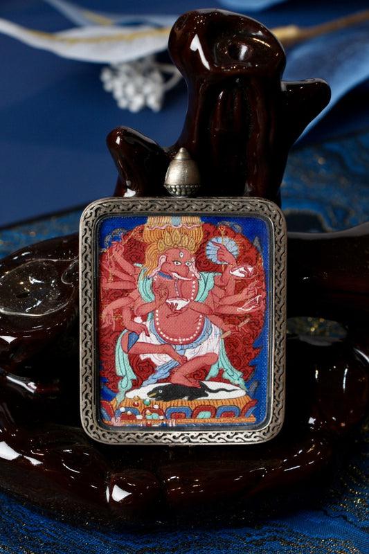 Ganesh elephant-headed deity thangka pendant symbolizing fortune, success, and the removal of obstacles in Tibetan Buddhism.