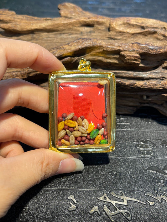 Close-up detail of the Garuda tsatsa clay relief showing mould and colour, Rekong tsatsa series.