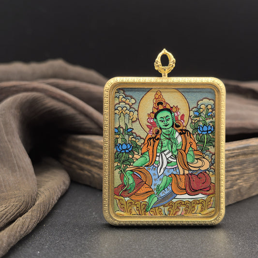 Detailed view of the titanium casing for the Green Tara Thangka pendant, symbolising compassion and tradition in Buddhist practice.