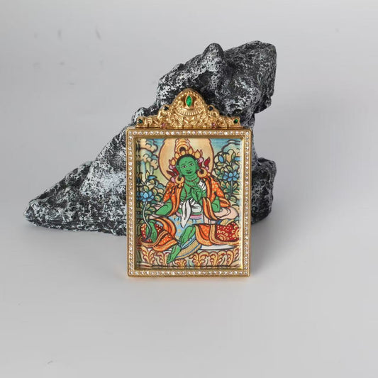 Close-up detail of the Nepal Elegant Green Tara Thangka painting showing intricate natural mineral pigment work, showcasing the masterful artistry of Nepali lineage painters.