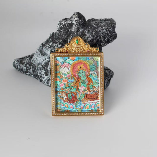 Close-up detail of the Nepal Premium Green Tara Thangka painting showing intricate natural mineral pigment work, showcasing the masterful artistry of Nepali lineage painters.