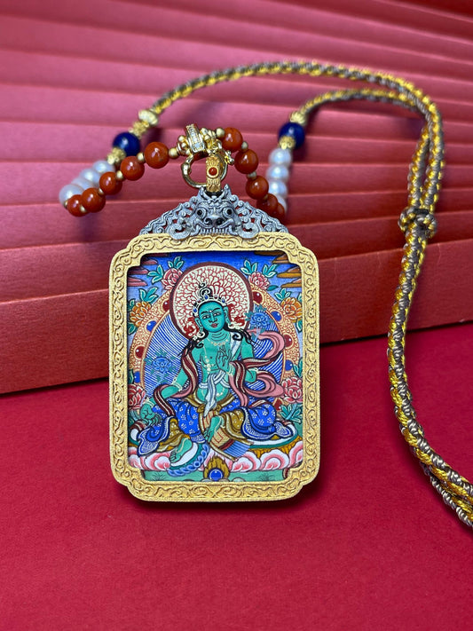 Hand-painted Rekong Green Tara (绿度母) Thangka pendant 3.5x4.5cm featuring compassion and liberation from suffering, representing vitality and female awakening in Buddhist tradition.