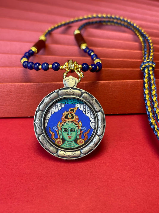 Hand-painted Rekong Green Tara (绿度母) Buddha Head series Thangka pendant 2.5cm with 925 silver casing featuring liberate from suffering and wisdom, representing fulfil wishes in Buddhist tradition.