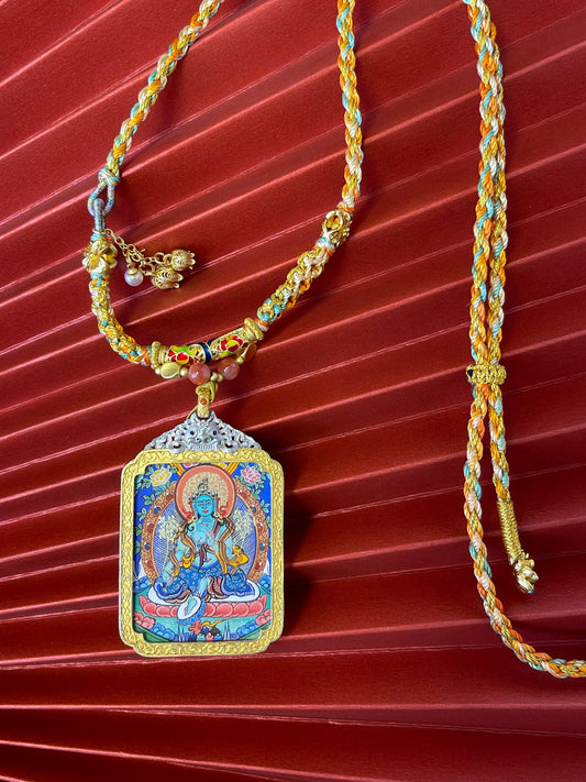 Close-up detail of the Rekong Green Tara Thangka showing mineral pigments lapis turquoise gold, Rekong series artistry.