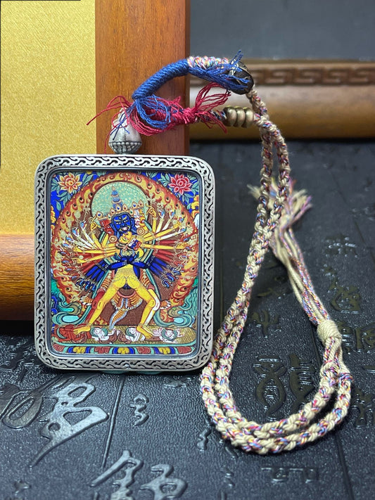 Close-up detail of the Rekong Kalachakra Thangka showing natural mineral pigments, Rekong series artistry.