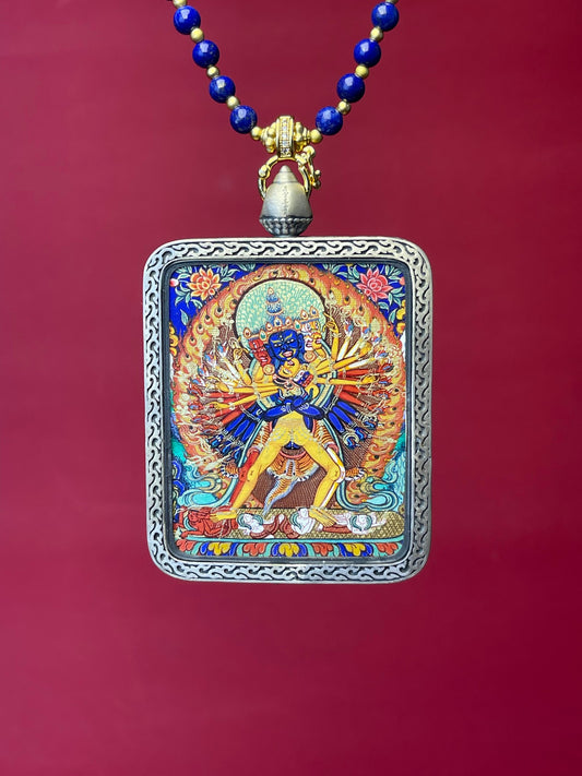 Detailed view of the copper casing for the Kalachakra Thangka pendant, symbolising the wheel of time and tradition in Buddhist practice.