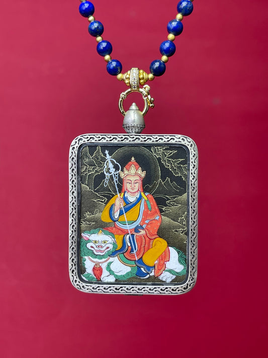 Close-up detail of the Rekong Ksitigarbha Thangka showing hand-painted mineral pigments and gold, showcasing the Rekong Black Gold series artistry.