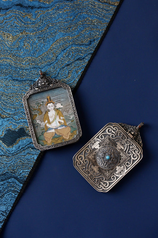 Tibetan Buddhist thangka pendant depicting Mahasthamaprapta Bodhisattva, symbolizing the power of wisdom and spiritual strength.