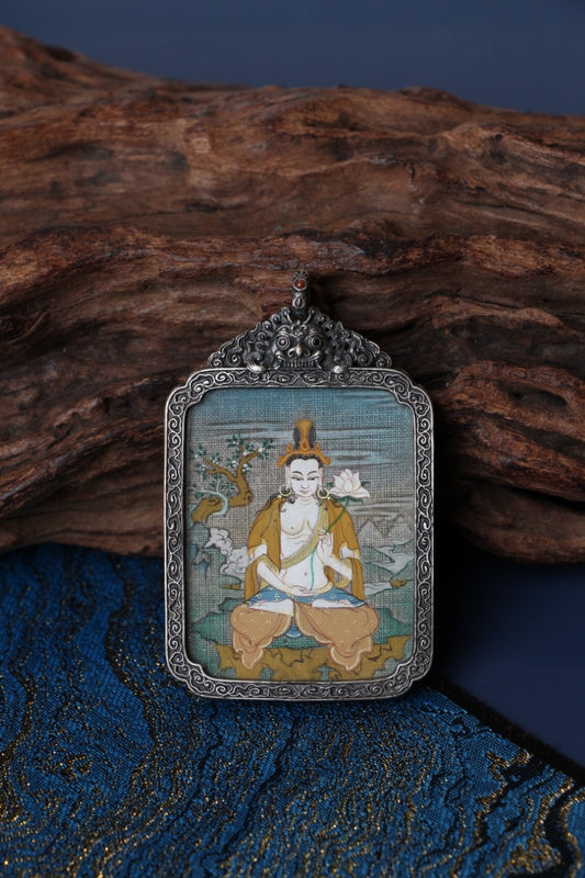 Tibetan thangka amulet featuring Mahasthamaprapta Bodhisattva, revered for spiritual power and inner clarity in Tibetan Buddhism.