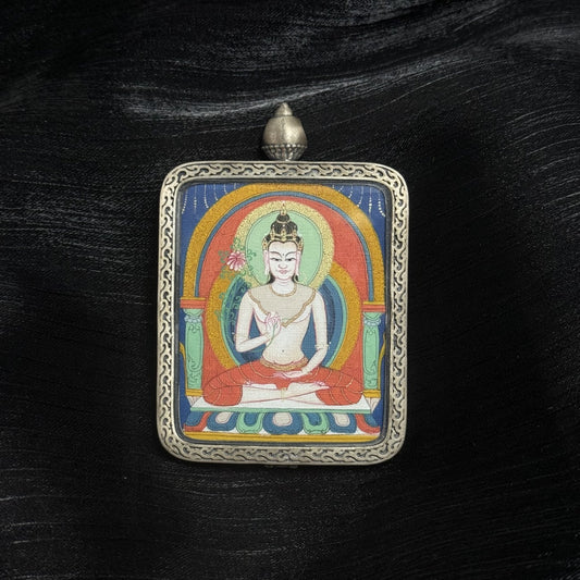 A 4x5cm hand-painted Karma Kagyu Mahasthamaprapta Bodhisattva Thangka pendant featuring the Bodhisattva of Great Might, encased in 925 silver Dunhuang Nine-Colour Deer casing, representing wisdom-light and success in Tibetan Buddhist tradition.