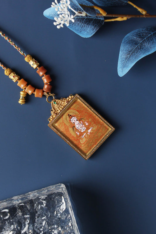 A 4x5cm hand-painted Rebgong Mahasthamaprapta Bodhisattva Thangka pendant featuring the Bodhisattva of Great Power, encased in titanium steel, representing wisdom and success in Tibetan Buddhist tradition.