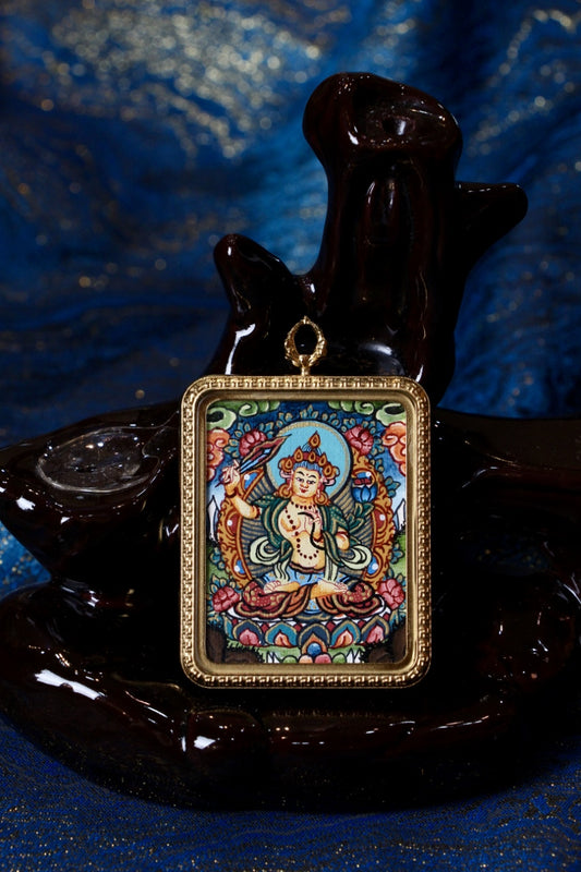 Manjushri Bodhisattva thangka pendant depicting the Tibetan Buddhist deity of wisdom, symbolizing insight, clarity, and enlightened knowledge.