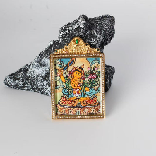 Close-up detail of the Nepal Elegant Manjushri Thangka painting showing intricate natural mineral pigment work, showcasing the masterful artistry of Nepali lineage painters