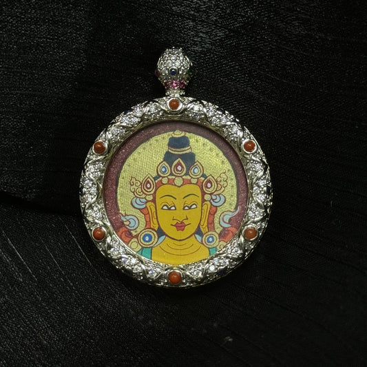 A 3x3cm hand-painted Rekong Red-Gold Manjushri Buddha Head Thangka pendant featuring the Bodhisattva of Wisdom, representing wisdom and blessing in Buddhist tradition.