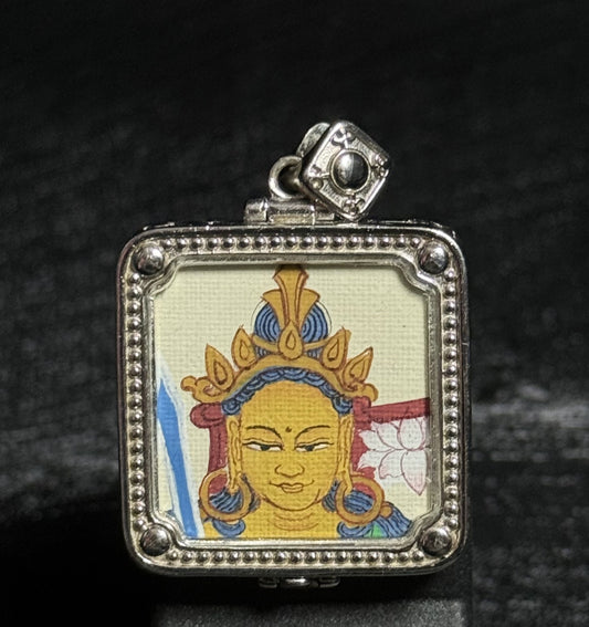 Close-up detail of the Tibet Manjushri Thangka painting showing natural mineral pigments, showcasing the masterful artistry of Tibetan lineage painters.